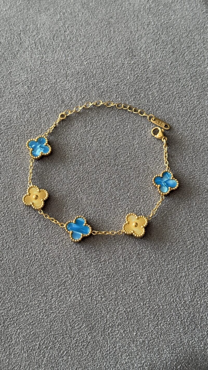 PULSERA TRÉBOL AZUL CLARO / ORO